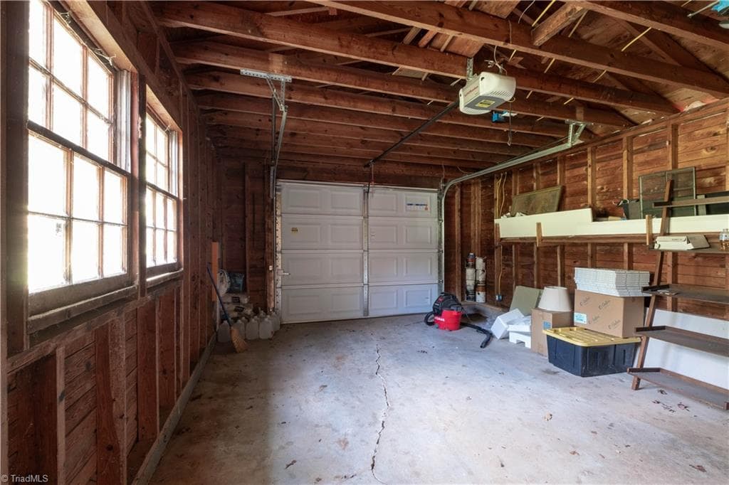 Attached one-car garage. Photo taken 2025. - 629 Oakland Drive, Elkin NC 28621, Elkin