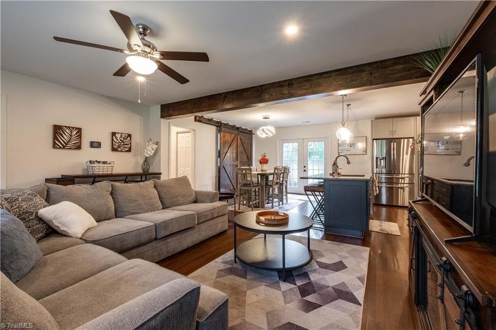 The open floor plan is ideal for entertaining. Photo taken 2025. - 629 Oakland Drive, Elkin NC 28621, Elkin