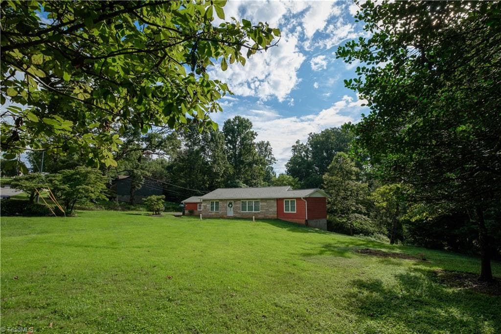 View of front yard. Photo taken 2025. - 629 Oakland Drive, Elkin NC 28621, Elkin