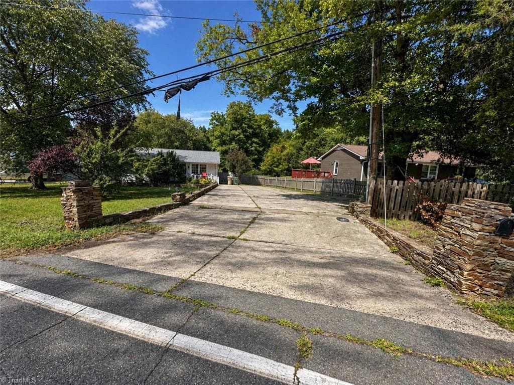 Stick/Site Built at 4711 Summit Avenue, Greensboro NC 27405, photo 2 of 27