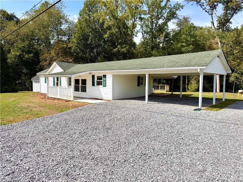 Ample parking with new gravel and 2 car carport parking - 6254 NC Highway 268, Dobson NC 27017, Dobson