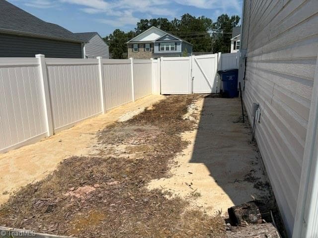 Extra fenced parking pad - 526 Leven Drive, Gibsonville NC 27249, Gibsonville