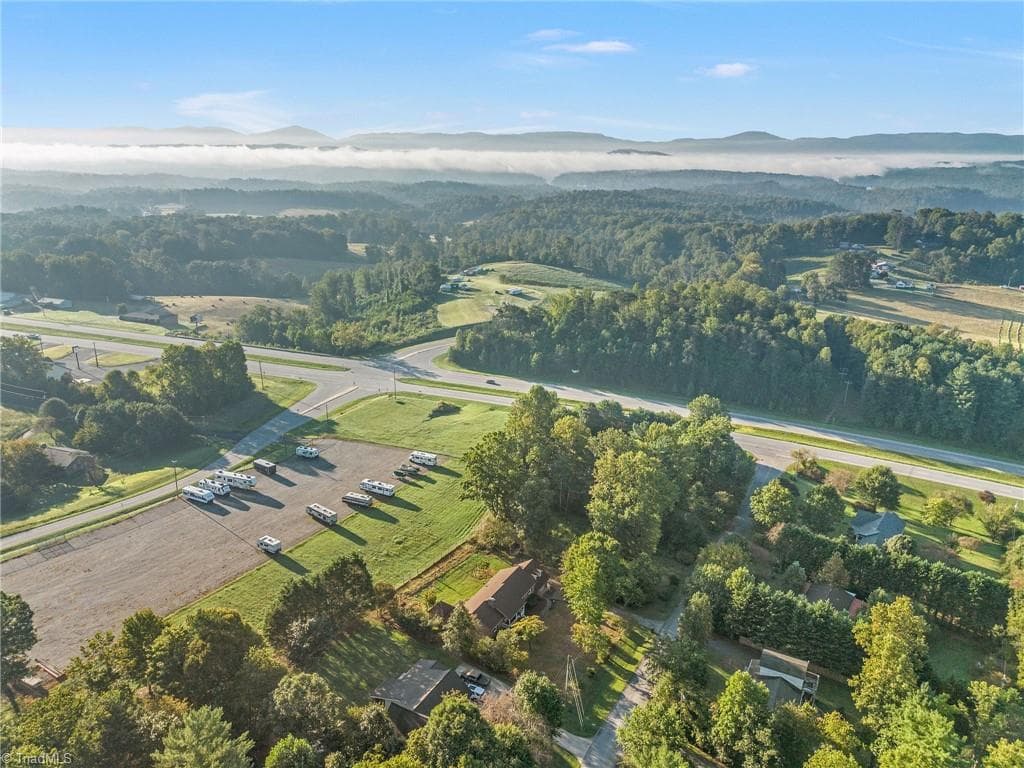 Early morning fog over the lake that's minutes away - 196 Lewis Fork Drive, Wilkesboro NC 28697, Wilkesboro