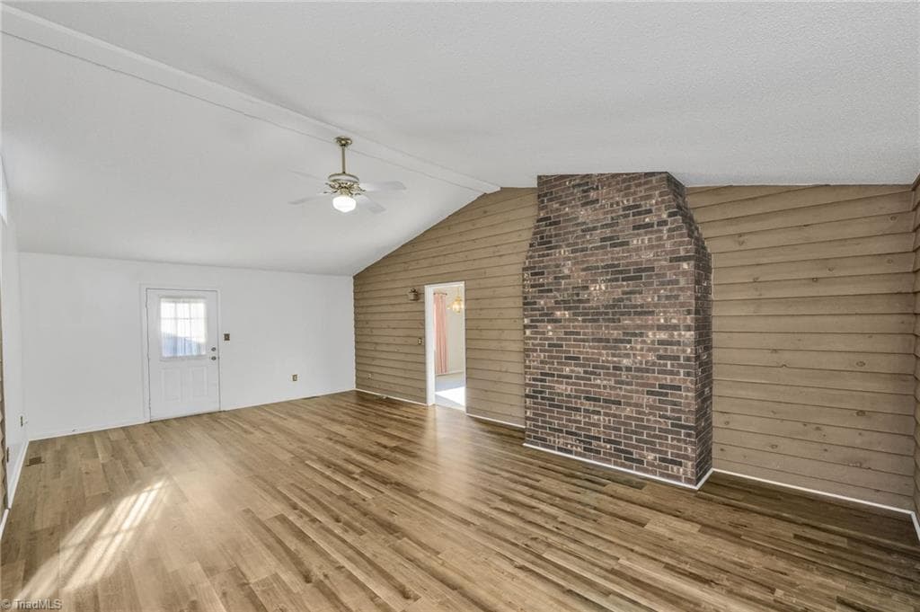 Den has lots of room for family and friends and an exit to the large deck and screened gazebo for outside entertaining - 196 Lewis Fork Drive, Wilkesboro NC 28697, Wilkesboro