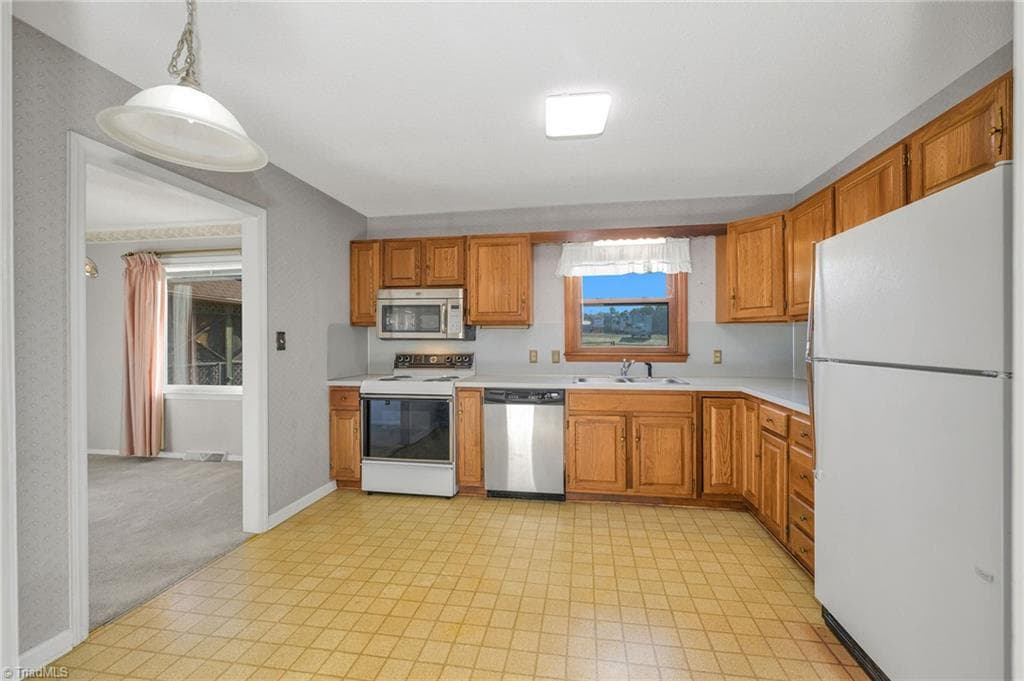 Eat-In Kitchen to Dining Room at left. - 196 Lewis Fork Drive, Wilkesboro NC 28697, Wilkesboro