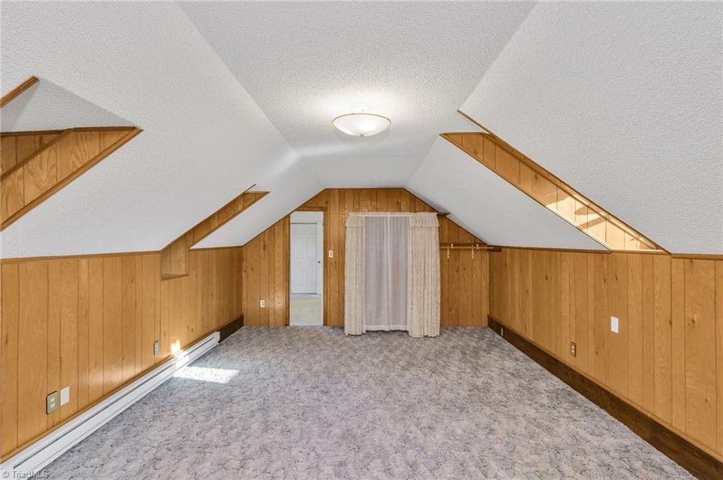 Bonus room is off 3rd Bedroom, has dormers bringing in great light for a home office, craft/sewing room, or play room. - 196 Lewis Fork Drive, Wilkesboro NC 28697, Wilkesboro