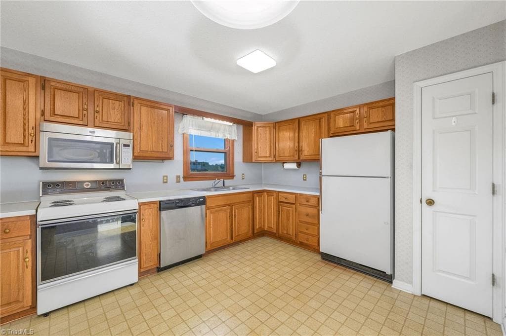Eat-In Kitchen with cupboard to right - 196 Lewis Fork Drive, Wilkesboro NC 28697, Wilkesboro