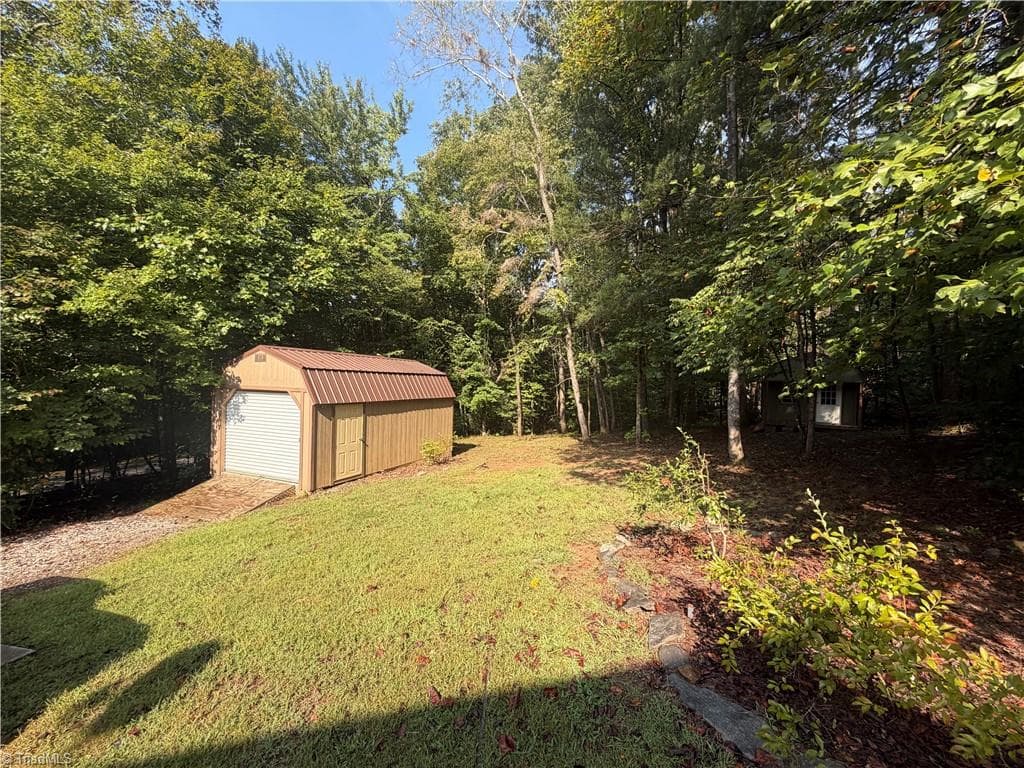 Stick/Site Built at 411 Cabin Cove Lane, Moravian Falls NC 28654, photo 30 of 43