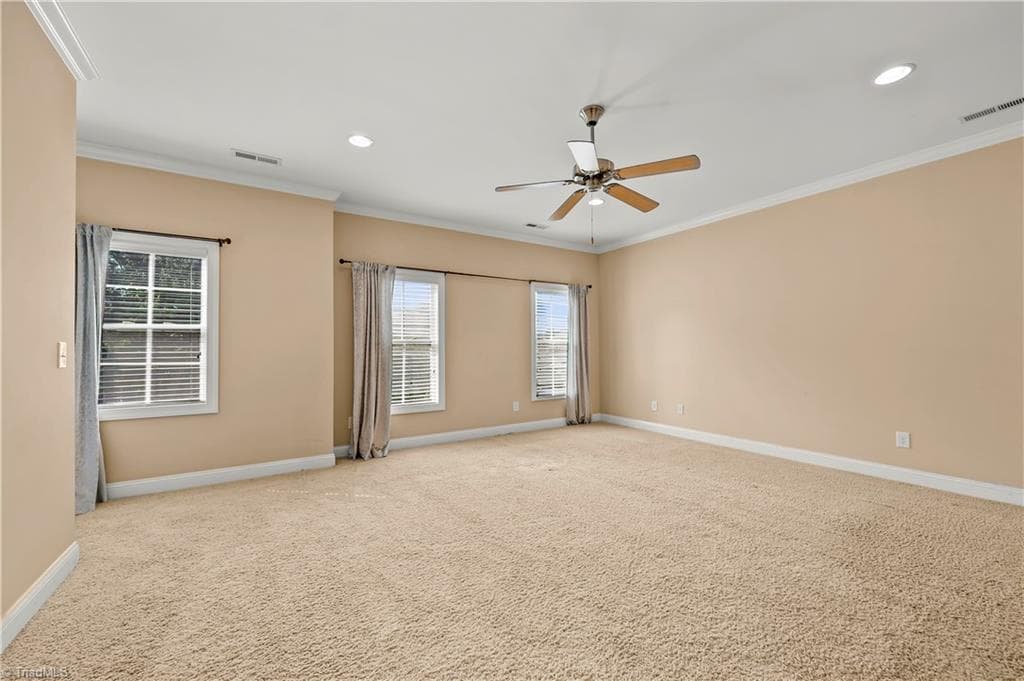 Spacious primary suite, three beautiful windows - 1249 Meadow Chase Drive, Lewisville NC 27023, Lewisville