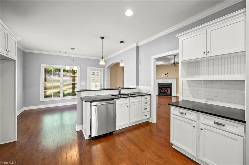Kitchen opens to living room - 1249 Meadow Chase Drive, Lewisville NC 27023, Lewisville