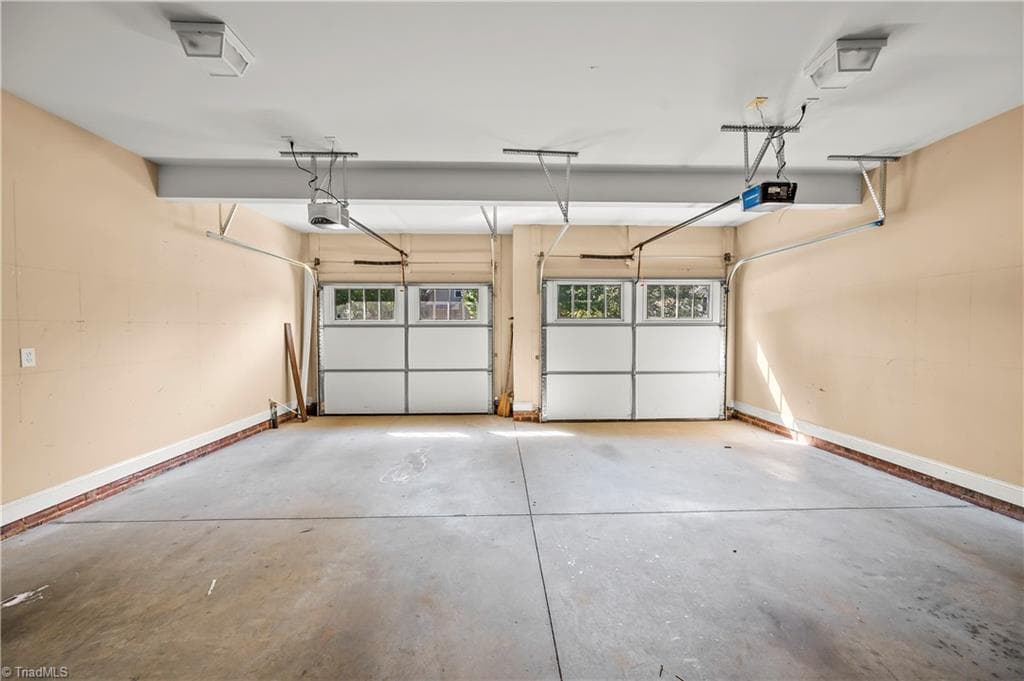 Two-car garage, windowed doors - 1249 Meadow Chase Drive, Lewisville NC 27023, Lewisville