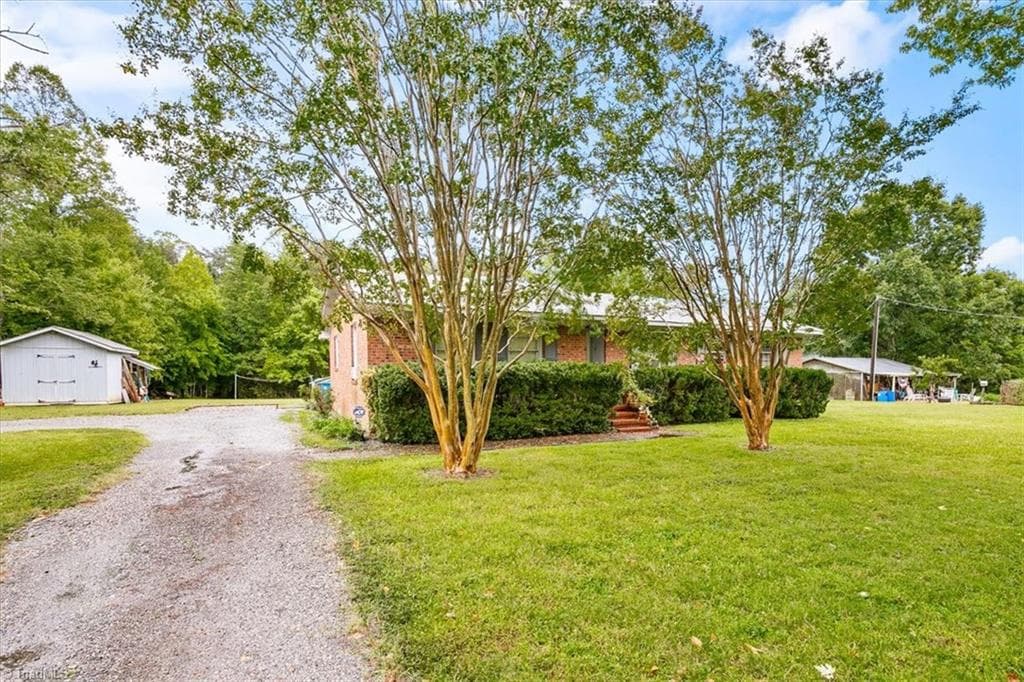 Driveway approach to the home - 5822 RuralView Road, Gibsonville NC 27249, Gibsonville