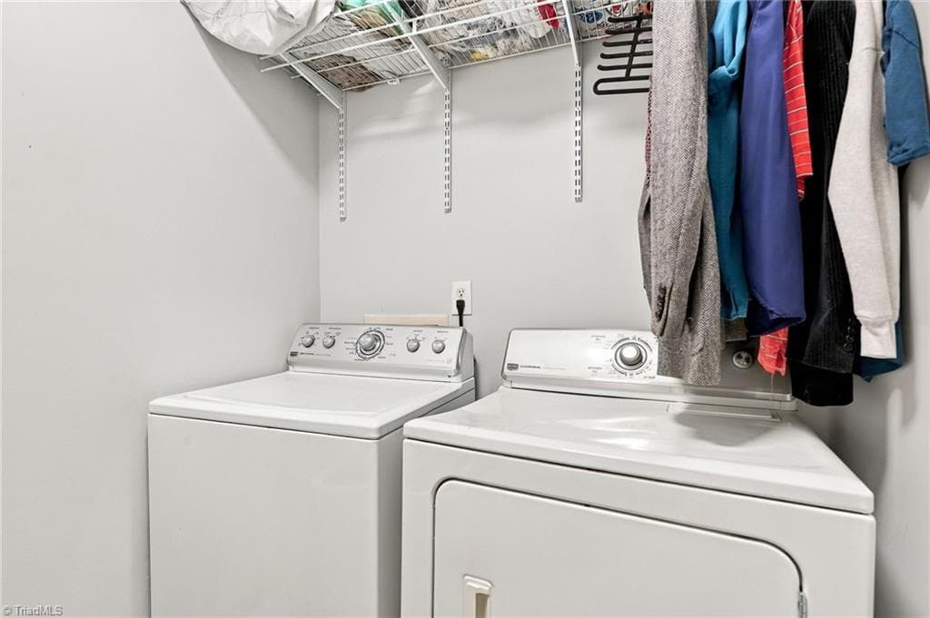 Laundry area near the kitchen. - 5928 W Friendly Avenue # M, Greensboro NC 27410, Greensboro