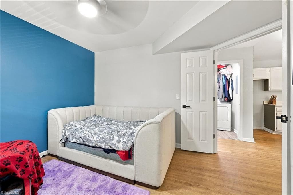 Second bedroom with ample closet storage near the living room. - 5928 W Friendly Avenue # M, Greensboro NC 27410, Greensboro