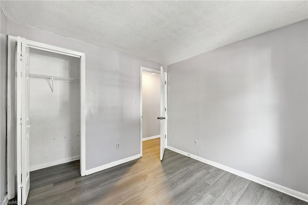 Second bedroom with ample closet space. - 5500 Richland Street # A, Greensboro NC 27409, Greensboro