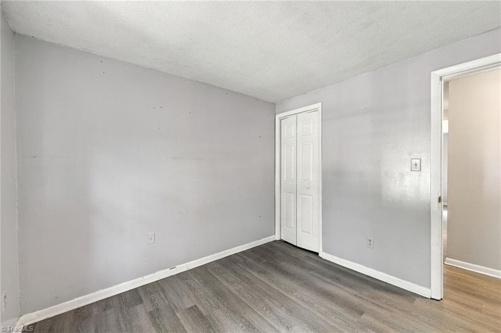 Second bedroom with ample closet space. - 5500 Richland Street # A, Greensboro NC 27409, Greensboro