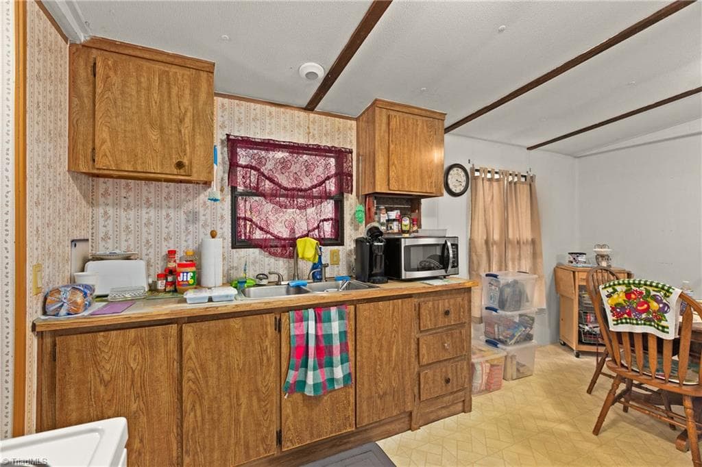 Manufactured Home at 1315 Pebble Brook Road, Sandy Ridge NC 27046, photo 9 of 24