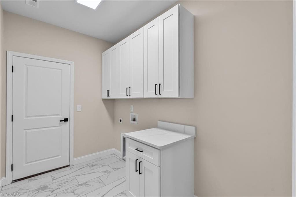 laundry room off garage - 4236 Wayne Road, Greensboro NC 27407, Greensboro