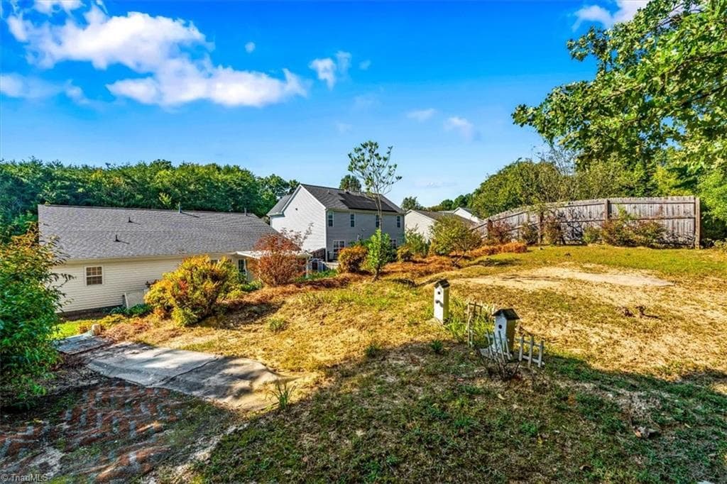 Even more backyard space for you to personalize and make your own~ Add an enchanted garden, a place of peace gazebo or a man cave or she shed! - 1891 Longmont Drive, Kernersville NC 27284, Kernersville