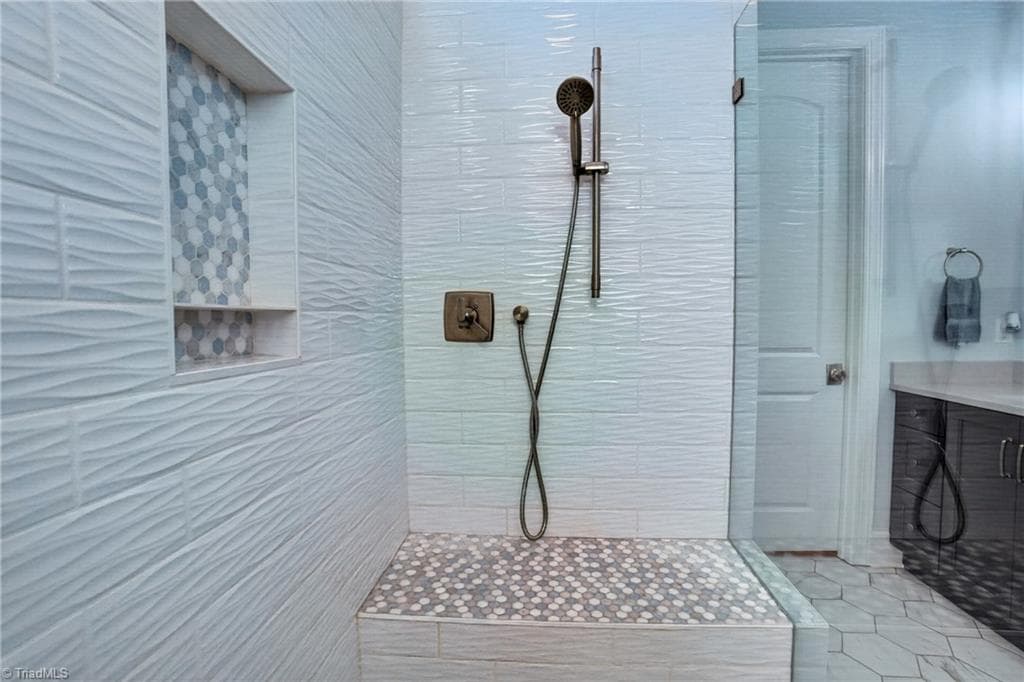 Tiled shower with a built-in niche - 117 Scenic View Trail, Madison NC 27025, Madison