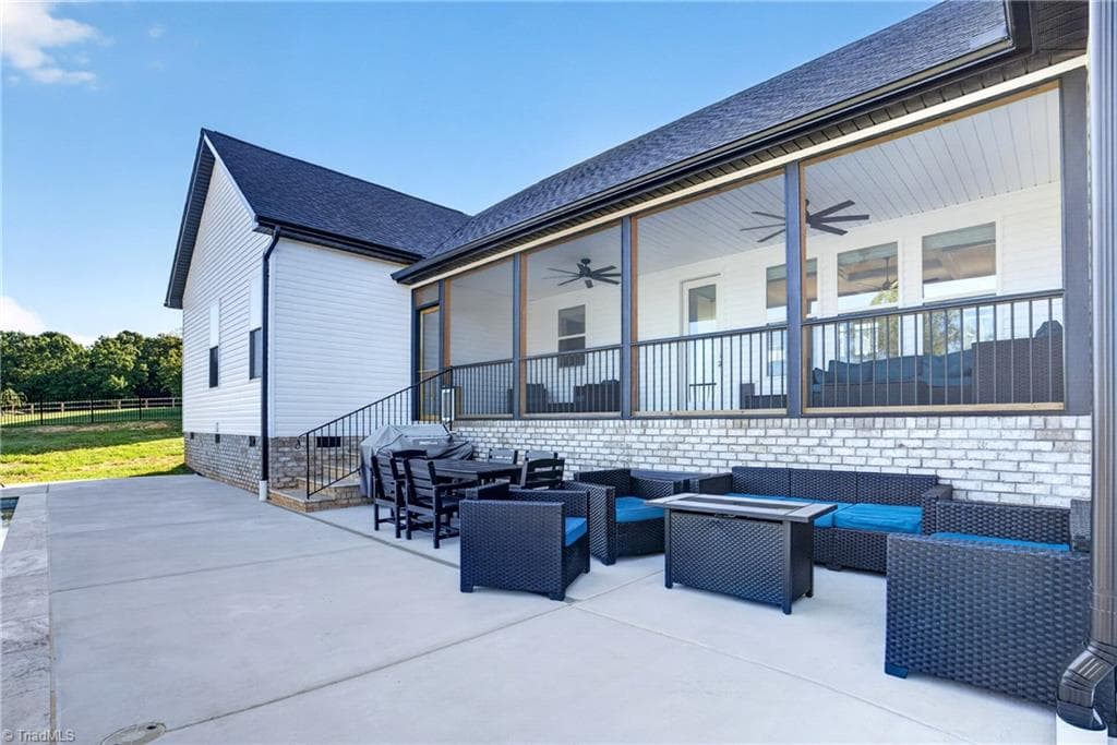 Covered patio overlooking the pool - 117 Scenic View Trail, Madison NC 27025, Madison