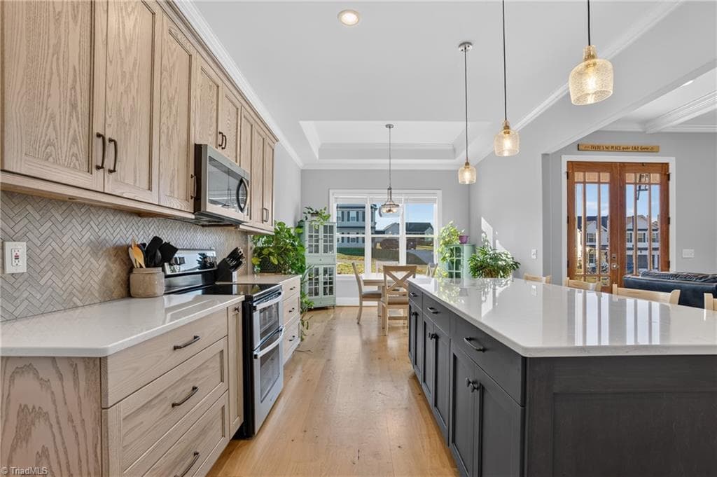 Light wood cabinetry and a generous island - 117 Scenic View Trail, Madison NC 27025, Madison