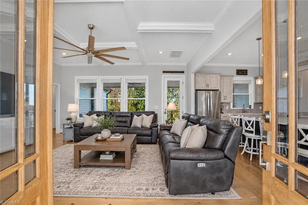 Coffered ceiling over a bright, open great room - 117 Scenic View Trail, Madison NC 27025, Madison