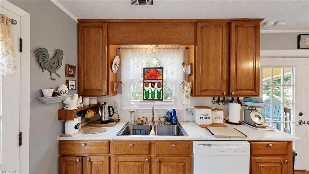 Kitchen view shows a window over the double sink, but note there is a dishwasher - 1823 Bantry Trail, Kernersville NC 27284, Kernersville