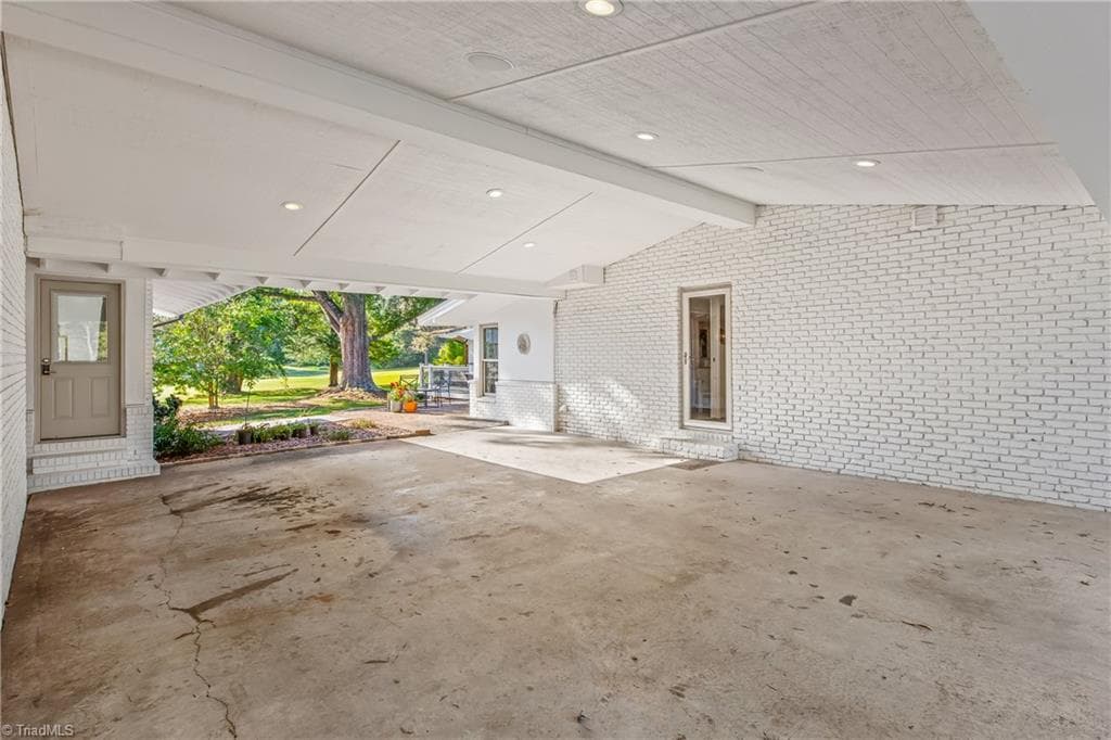 Carport between main house and garage - 611 Burning Tree Circle, High Point NC 27265, High Point