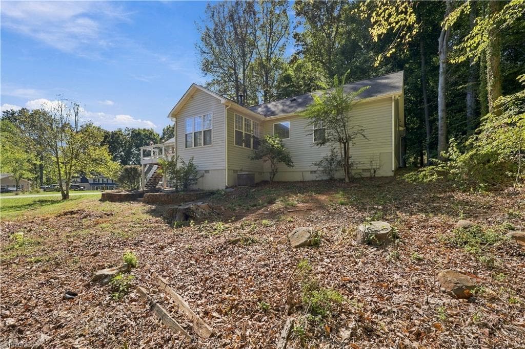 Side view of house - 7500 Bartonshire Court, Oak Ridge NC 27310, Oak Ridge
