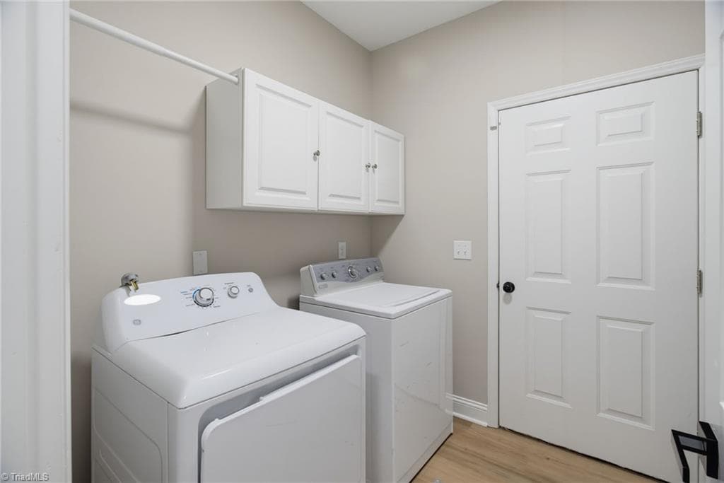 Spacious laundry room with utility sink. - 2100 Gate Post Drive, Greensboro NC 27455, Greensboro