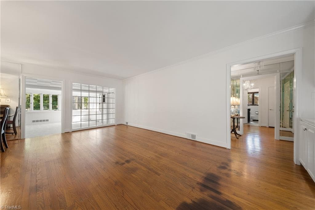 View of living room from foyer and includes entrance to sunroom - 1051 Vernon Avenue, Winston-Salem NC 27106, Winston-Salem