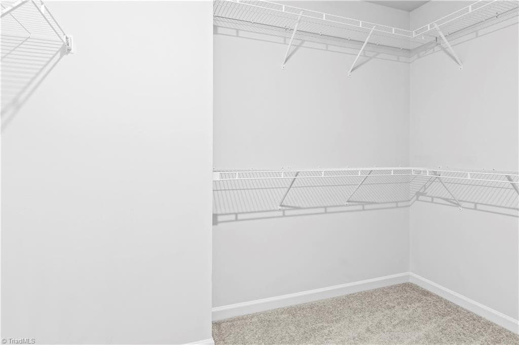 Walk-in wardrobe in Primary bedroom - 1820 Wilma Avenue, Winston-Salem NC 27127, Winston-Salem