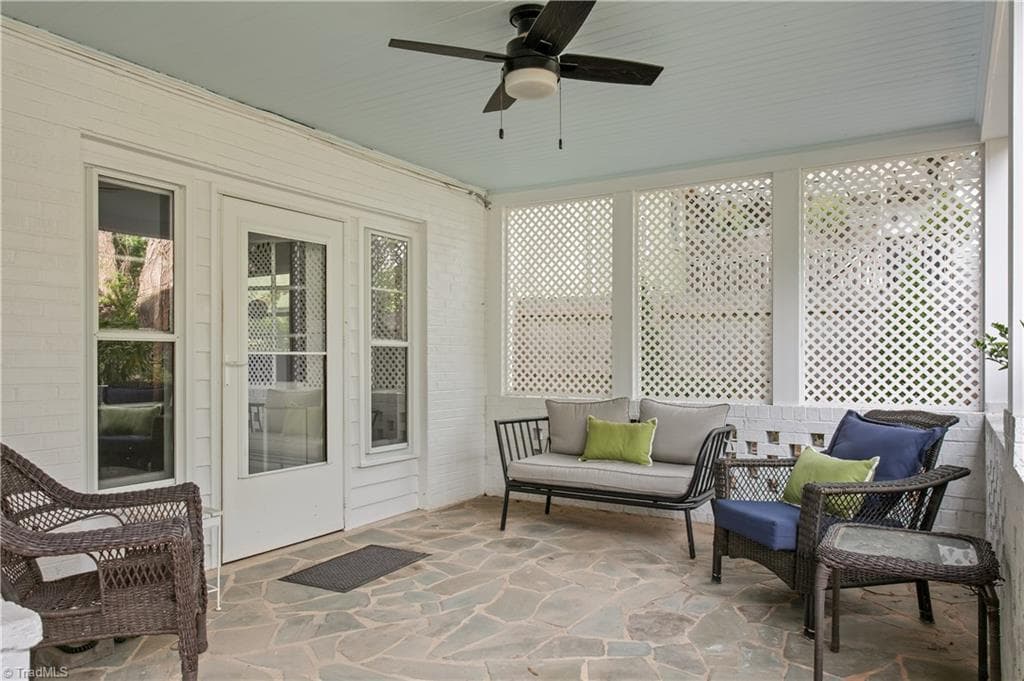 Covered porch off the basement living space. - 1206 Hill Street, Greensboro NC 27408, Greensboro