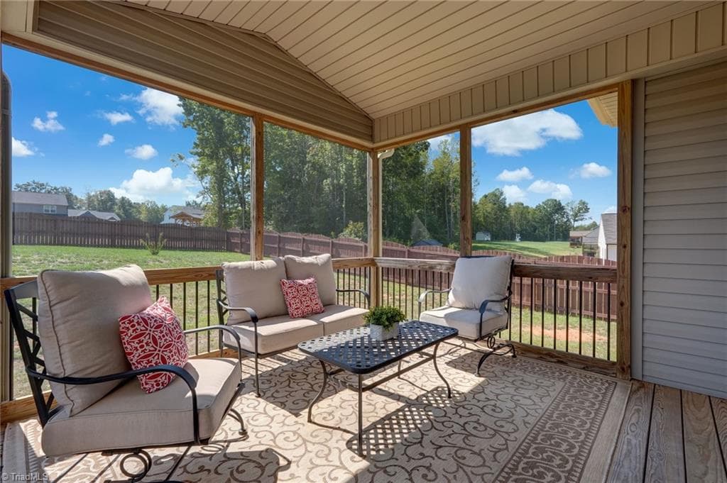 Spacious screened porch extends the home's living space outdoors - 1466 Kernodle Landing Drive, Burlington NC 27217, Burlington