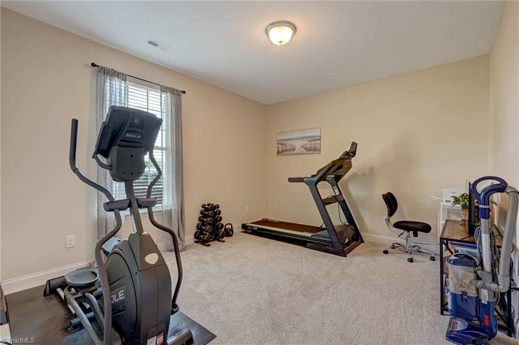 Versatile flex room can easily serve as an office, workout room, hobby space, playroom, or whatever fits your lifestyle - 1466 Kernodle Landing Drive, Burlington NC 27217, Burlington