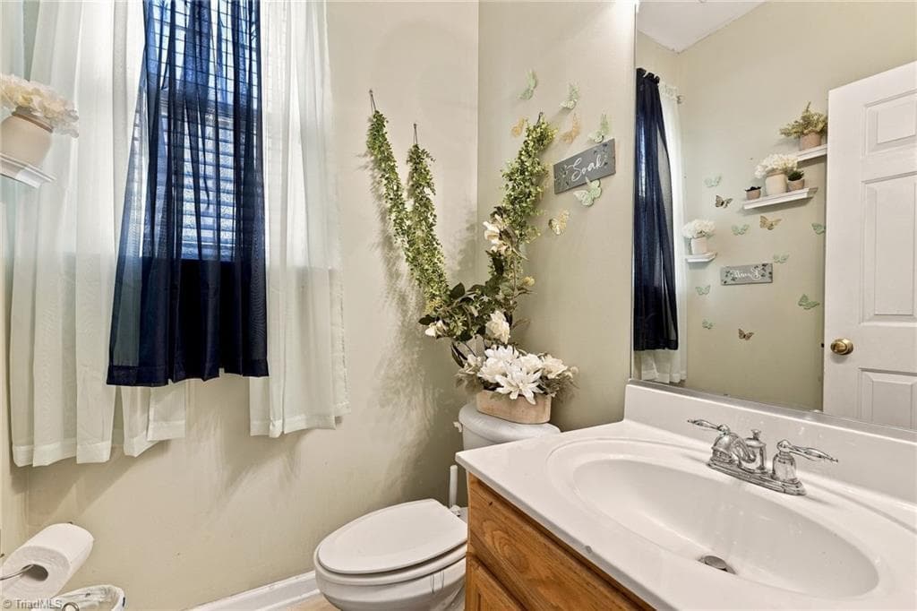 Main level 1/2 bath - 6005 Elderbush Drive, Greensboro NC 27405, Greensboro