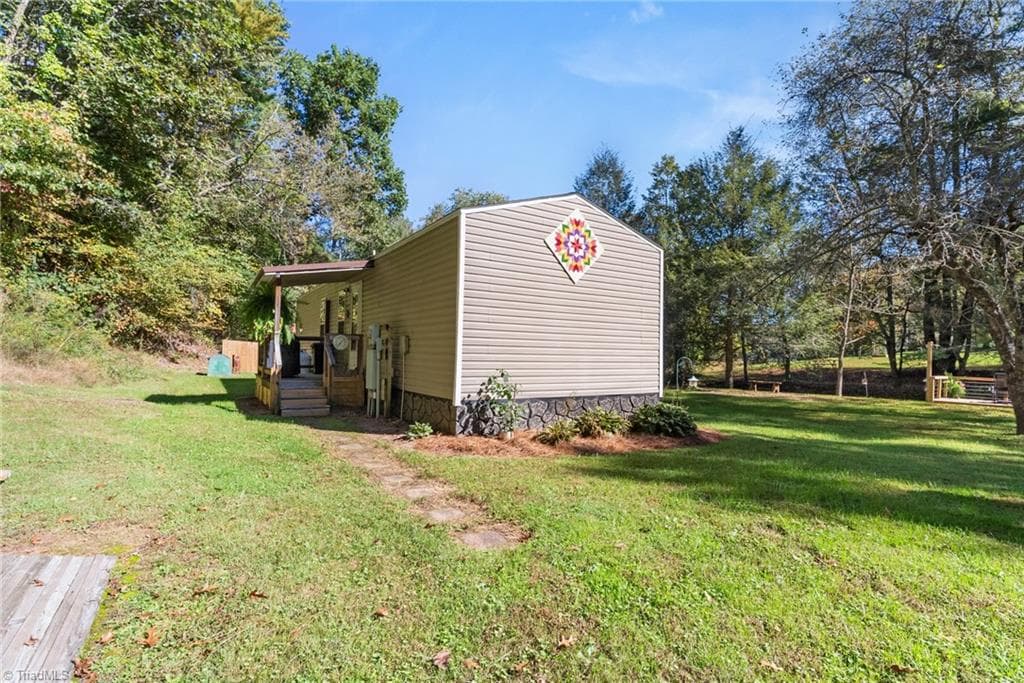 Manufactured Home at 99 Lynn Lane, Glade Valley NC 28627, Glade Valley, photo 30 of 45