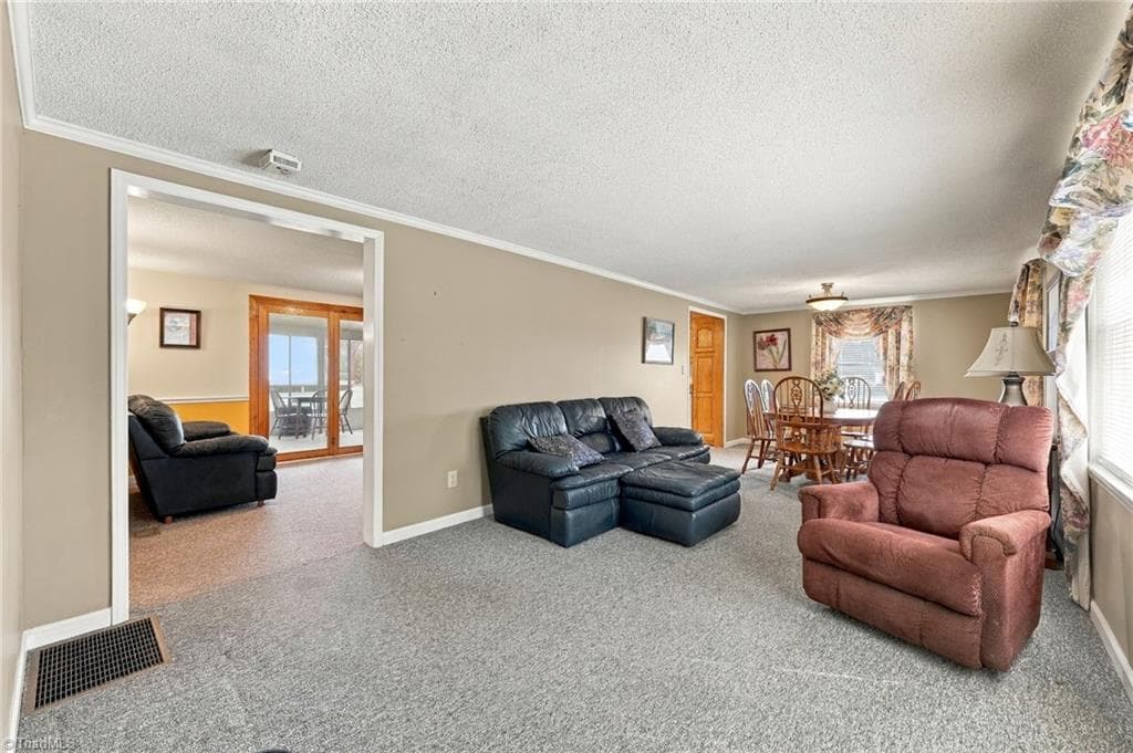 Manufactured Home at 1077 Brown Farm Road, Walnut Cove NC 27052, Walnut Cove, photo 5 of 48