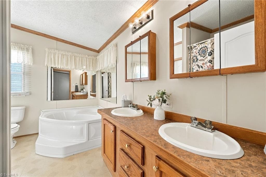Manufactured Home at 5498 Covered Bridge Road, Trinity NC 27370, photo 10 of 35