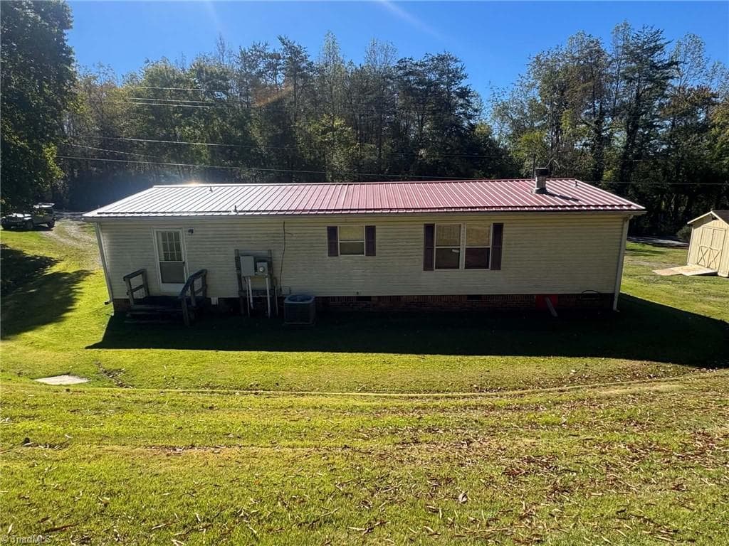 Manufactured Home at 256 Brookfall Dairy Road, Elkin NC 28621, photo 6 of 25