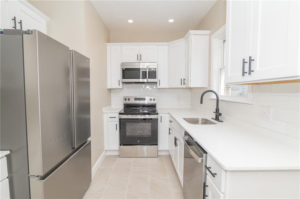 Single Family Residence at 61 Leah Street, Providence, photo 7 of 16