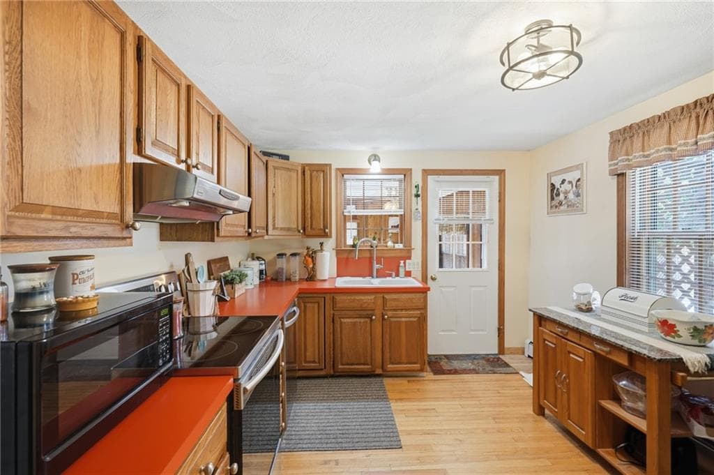 Single Family Residence at 5675 Flat River Road, Coventry, photo 12 of 39