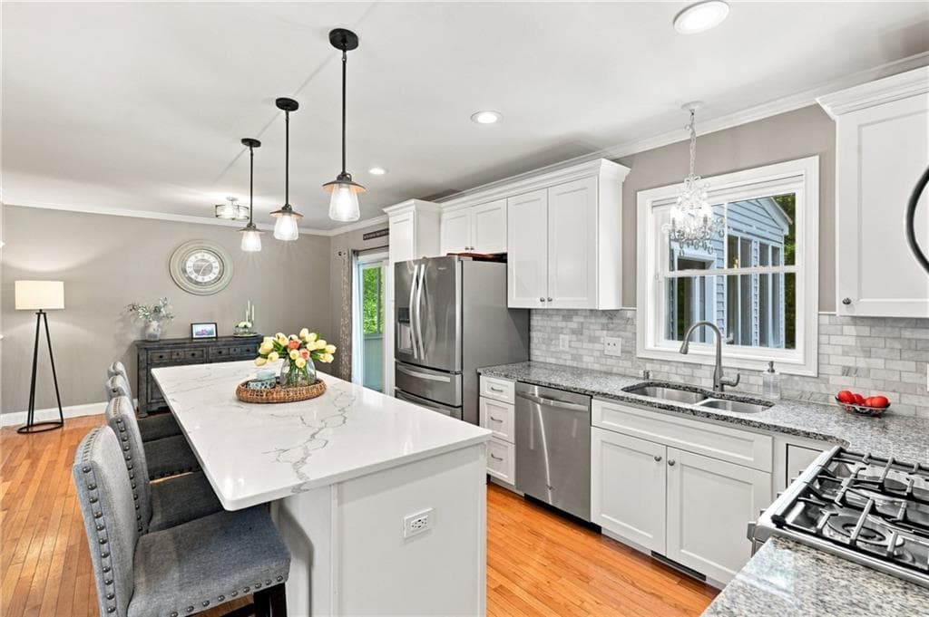 Single Family Residence at 114 Teakwood Drive W, Coventry, photo 12 of 50
