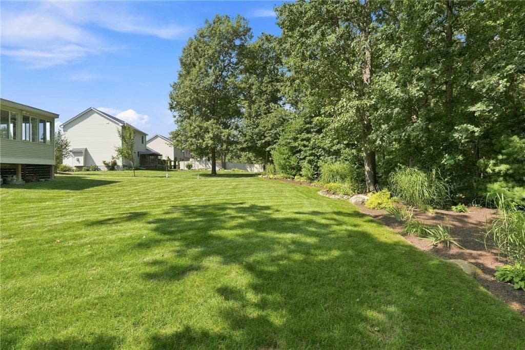 Single Family Residence at 114 Teakwood Drive W, Coventry, photo 37 of 50