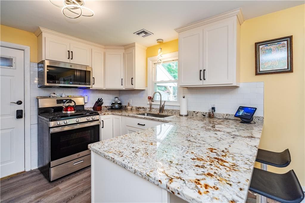 Single Family Residence at 6 Manor Drive, Coventry, photo 11 of 35