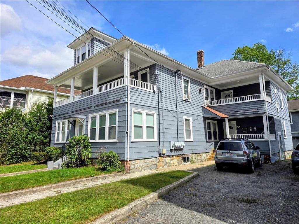 Multi Family at 668 Grove Street, Woonsocket, photo 2 of 13