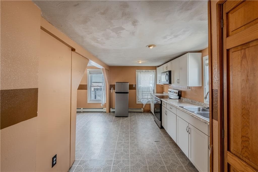 Single Family Residence at 738 Lonsdale Avenue, Central Falls, photo 3 of 10