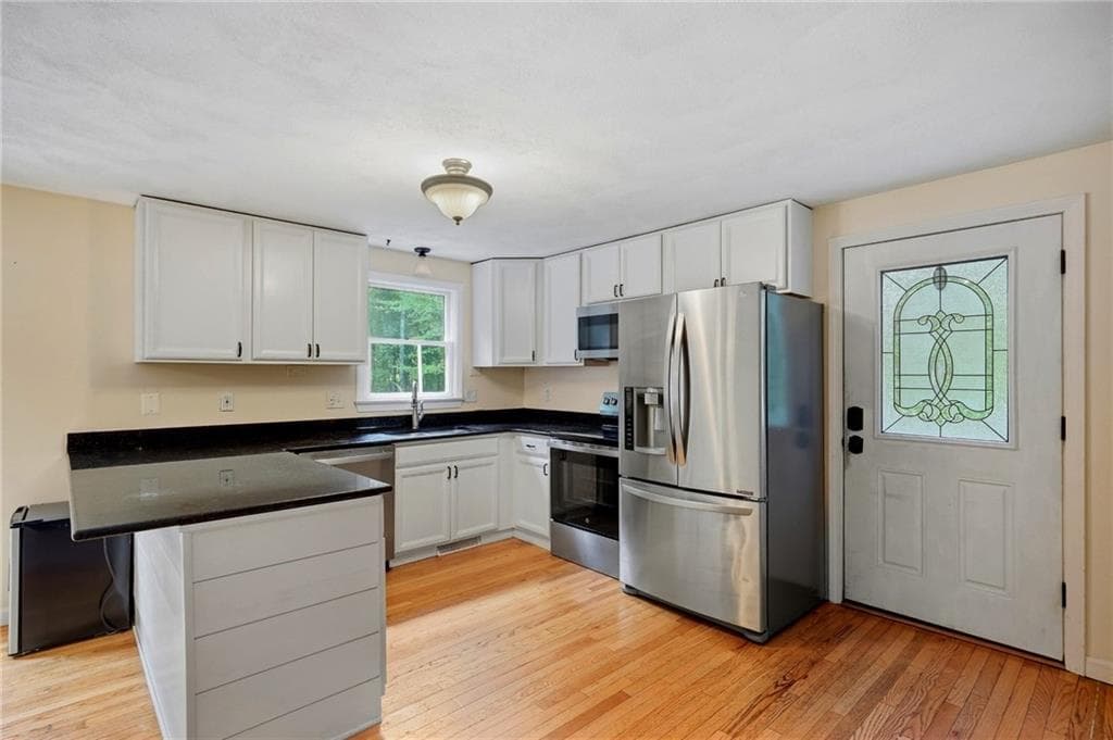 Single Family Residence at 42 Tiffany Road, Coventry, photo 10 of 37