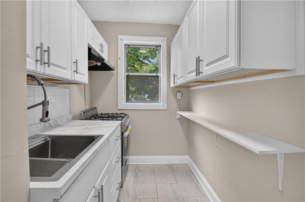 Multi Family at 28 Pumgansett Street, Providence, photo 17 of 50